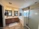 Bathroom with double sinks, soaking tub, and shower at 5744 W Siesta Way, Laveen, AZ 85339