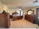 Large bedroom with a king-size bed, dresser, and ceiling fan at 5744 W Siesta Way, Laveen, AZ 85339