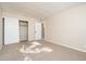 Spacious bedroom with a large closet and carpeted floor at 5855 N 48Th Ave, Glendale, AZ 85301