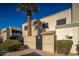 Exterior view of the building with a gate and landscaping at 5855 N 48Th Ave, Glendale, AZ 85301