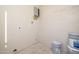 Laundry room with water heater and storage space at 5855 N 48Th Ave, Glendale, AZ 85301