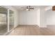 Simple dining area with sliding glass doors to backyard at 5932 W Holly St, Phoenix, AZ 85035