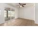 Bright dining room with sliding glass doors leading to the pool at 5932 W Holly St, Phoenix, AZ 85035