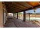 Brick patio with covered area overlooking the pool at 5932 W Holly St, Phoenix, AZ 85035