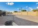 Spacious backyard with gravel and fire pit at 6702 E Adobe St, Mesa, AZ 85205