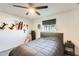 Bedroom with a bed, ceiling fan, and Nerf guns at 6702 E Adobe St, Mesa, AZ 85205