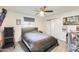 Bedroom with a bed, ceiling fan and window at 6702 E Adobe St, Mesa, AZ 85205