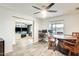 Dining area with wooden table and view to living room at 6702 E Adobe St, Mesa, AZ 85205