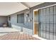 Front door entry with security gate, decorative glass, and walkway at 6702 E Adobe St, Mesa, AZ 85205