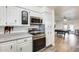 Kitchen with stainless steel appliances and view to game room at 6702 E Adobe St, Mesa, AZ 85205