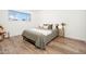 Serene bedroom with a modern aesthetic and wood floors at 6805 E 2Nd St # 17, Scottsdale, AZ 85251