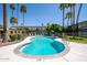 Inviting kidney-shaped pool with palm trees at 6805 E 2Nd St # 17, Scottsdale, AZ 85251