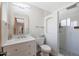 Modern bathroom with a glass shower, toilet, and vanity at 6912 E Larkspur Dr, Scottsdale, AZ 85254