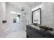 Elegant bathroom with a walk-in shower, freestanding tub, and modern vanity at 6912 E Larkspur Dr, Scottsdale, AZ 85254