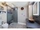 Modern bathroom with a glass shower, copper sink, and antler chandelier at 6912 E Larkspur Dr, Scottsdale, AZ 85254