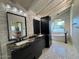 Modern bathroom with soaking tub and double vanity at 6912 E Larkspur Dr, Scottsdale, AZ 85254