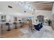 Farmhouse dining room with large table and high ceilings at 6912 E Larkspur Dr, Scottsdale, AZ 85254