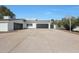 Modern home with attached two-car garage and ample driveway parking at 6912 E Larkspur Dr, Scottsdale, AZ 85254