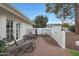 Relaxing patio area with wooden chairs and brick pavers at 6912 E Larkspur Dr, Scottsdale, AZ 85254