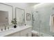 Modern bathroom with double vanity and glass shower at 747 E Nolan Pl, Chandler, AZ 85249