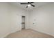 Bedroom with double door closet and ceiling fan at 747 E Nolan Pl, Chandler, AZ 85249