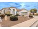 One-story home with a two-car garage and well-maintained landscaping at 747 E Nolan Pl, Chandler, AZ 85249