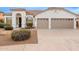 Single-story home with two-car garage and desert landscaping at 747 E Nolan Pl, Chandler, AZ 85249