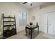 Home office with desk, shelving and large window at 747 E Nolan Pl, Chandler, AZ 85249