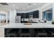 Modern kitchen with dark cabinets and white countertops at 747 E Nolan Pl, Chandler, AZ 85249