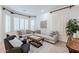 Living room with bay window, neutral decor, and comfortable seating at 747 E Nolan Pl, Chandler, AZ 85249