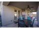 Patio with table and chairs, providing extra outdoor space at 7934 W Andrea Dr, Peoria, AZ 85383