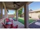 Relaxing covered patio overlooking the backyard at 7934 W Andrea Dr, Peoria, AZ 85383