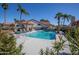 Community pool and cabana offers a relaxing outdoor space with lounge chairs and tropical landscaping at 8243 E Cortez Dr, Scottsdale, AZ 85260