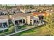 A scenic aerial view of the house showcasing landscaping, patio, and well-manicured backyard at 8334 E Jenan Dr, Scottsdale, AZ 85260