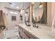 Contemporary bathroom featuring double sinks, pendant lighting, and a modern design at 8334 E Jenan Dr, Scottsdale, AZ 85260