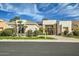 Inviting single-story home with manicured landscaping, desert plants, and a pristine front lawn at 8334 E Jenan Dr, Scottsdale, AZ 85260