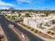 Aerial view of community, showcasing surrounding landscape and mountain views at 8626 E Mackenzie Dr, Scottsdale, AZ 85251