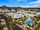 Aerial view of community pool and surrounding buildings at 8626 E Mackenzie Dr, Scottsdale, AZ 85251