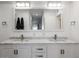 Modern bathroom with double vanity and marble countertops at 8626 E Mackenzie Dr, Scottsdale, AZ 85251