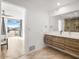 Modern bathroom with a walk-in shower and floating vanity at 8626 E Mackenzie Dr, Scottsdale, AZ 85251