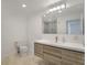 Modern bathroom with floating vanity and large mirror at 8626 E Mackenzie Dr, Scottsdale, AZ 85251