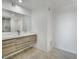 Modern bathroom with double vanity and a walk-in shower at 8626 E Mackenzie Dr, Scottsdale, AZ 85251