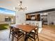 Open concept dining area with kitchen view at 8626 E Mackenzie Dr, Scottsdale, AZ 85251