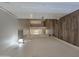 Clean hallway with wood-look laminate flooring at 8651 W Glenrosa Ave, Phoenix, AZ 85037