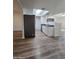 Kitchen with stainless steel refrigerator and white cabinets at 8651 W Glenrosa Ave, Phoenix, AZ 85037