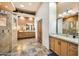 Large Primary bathroom with double vanities and a walk-in shower at 9135 E Buckskin Trl, Scottsdale, AZ 85255