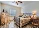 Guest bedroom with a wooden armoire and window shutters at 9135 E Buckskin Trl, Scottsdale, AZ 85255