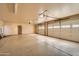 Spacious three-car garage with epoxy flooring and automatic openers at 9135 E Buckskin Trl, Scottsdale, AZ 85255