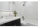 Modern bathroom with a soaking tub, double vanity, and updated fixtures at 929 E Granada Rd, Phoenix, AZ 85006