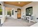 Relaxing front porch with wooden ceiling and comfortable seating at 929 E Granada Rd, Phoenix, AZ 85006